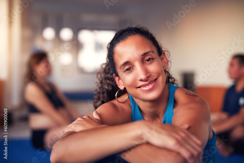 portrait beautiful mid adult latina cheerful sporty woman in gym interior