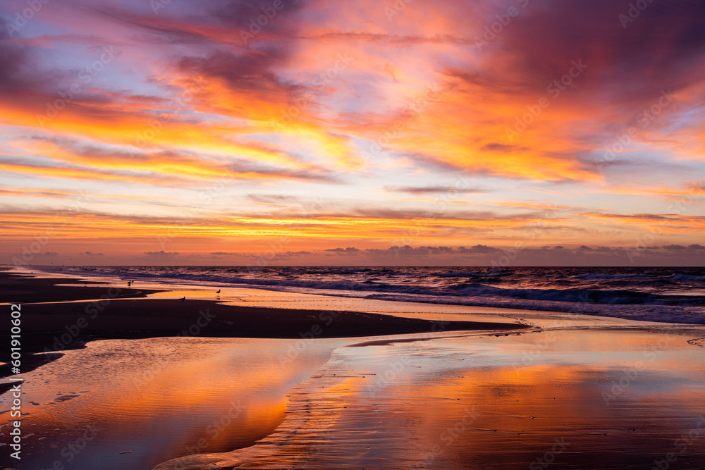 Colorful Morning Sky Reflecting on the Wet Sand