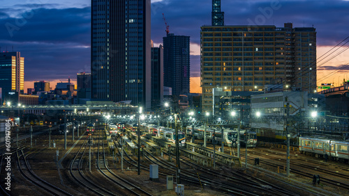 Train depot at Nagoya station at night.