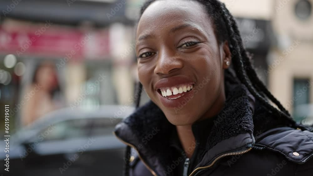African american woman smiling confident standing at street African american woman smiling confident standing at street