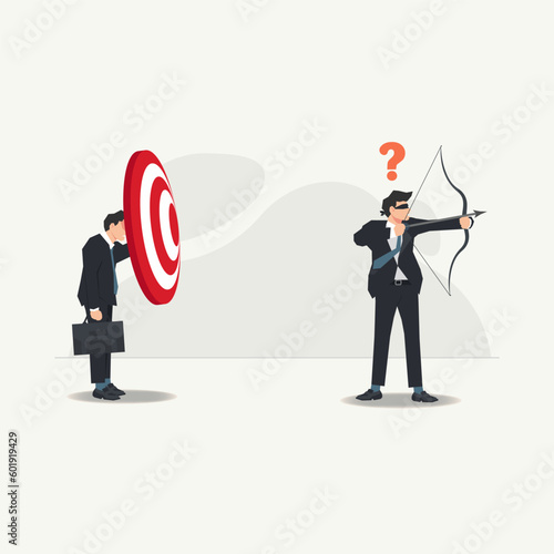 Vector businessman with blindfold trying to shoot the target but wrong direction. Business without vision and mission concept illustration