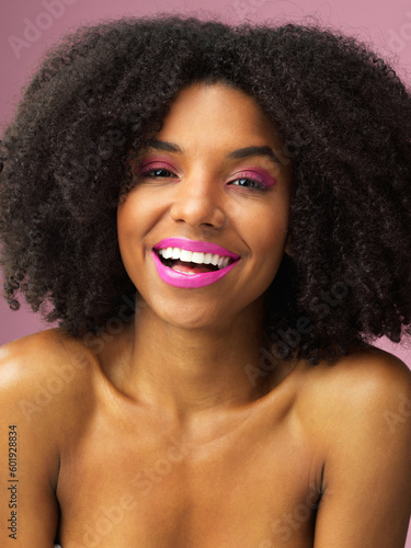 Face, hair care and funny black woman with makeup in studio isolated on a pink background for skincare. Hairstyle portrait, cosmetics and African female model with salon treatment for afro beauty.