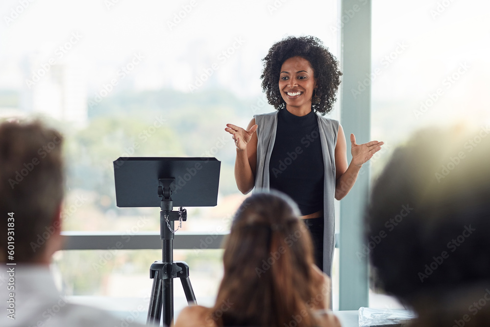 Fototapeta premium Corporate, businesswoman with presentation and in business meeting in conference room at work. Presenter, happy female speaker and black woman at seminar or workshop speaking with businesspeople