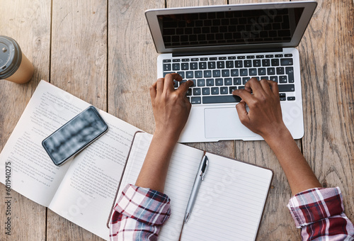 Fotografie Woman, hands and laptop of student on mockup above for studying, education or research at cafe