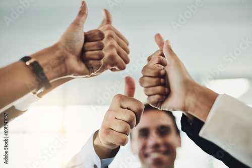 Business people, hands and thumbs up for winning, success or teamwork achievement at office. Hand of employee group showing thumb emoji, yes sign or like in team win, victory or good job at workplace