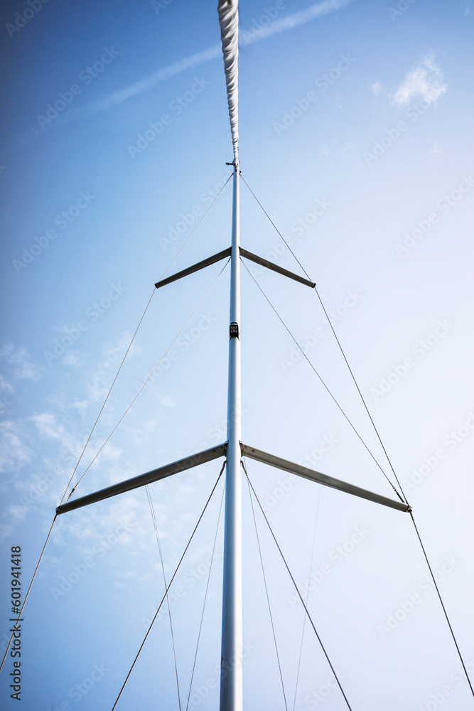 Sail Mast and spreader details from a sailboat Sail Mast and spreader details from a sailboat
