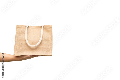 Man holding jute bag or sack bag on white background. Reusable shopping bag. Plastic free. Eco friendly concept. Sack bag for reusable shopping lifestyles, ecology business concept.