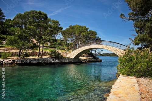 Stone bridge on island Mljet in Croatia between Large and Small lake © Vedrana
