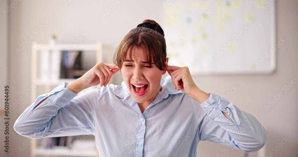 Woman Covering Her Ears With Fingers Woman Covering Her Ears With Fingers