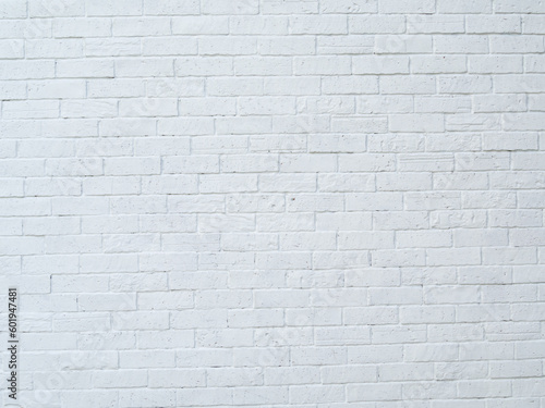 Brick wall and white surface  clean  rough  uneven surface material. Retro decoration construction.