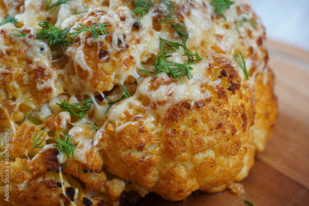 Homemade Whole Roasted Cauliflower with cheese and herbs Homemade Whole Roasted Cauliflower with cheese and herbs