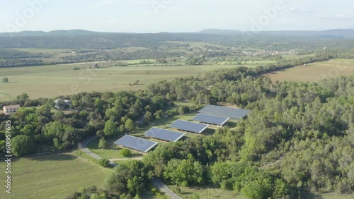 Wallpaper Mural Aerial shot of photovoltaic panels in the heart of a forest in the French countryside Torontodigital.ca