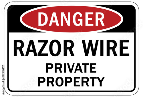 Barbed and razor wire warning sign and labels private property