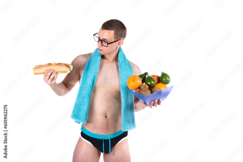 Sports and diet. Attractive man and healthy lifestyle. White background. Sports and diet. Attractive man and healthy lifestyle. White background.