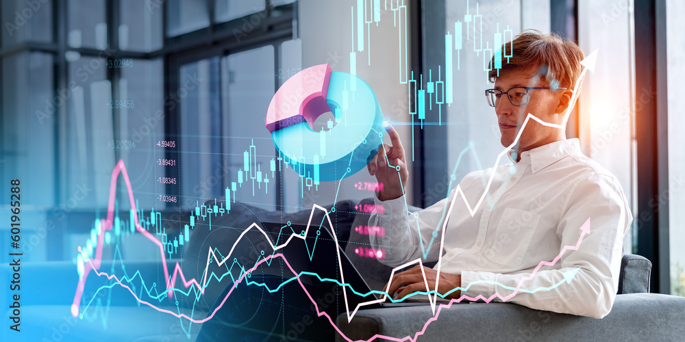 Businessman with laptop, finger touch pie chart and forex diagrams ...
