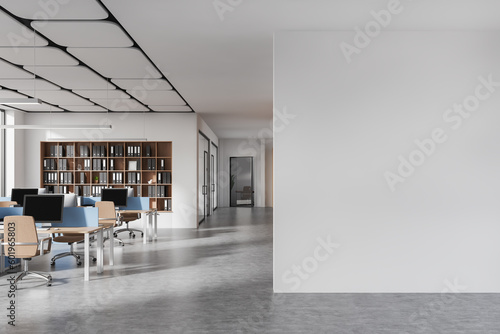 Stylish office room interior with coworking zone, shelf in hallway. Mockup wall