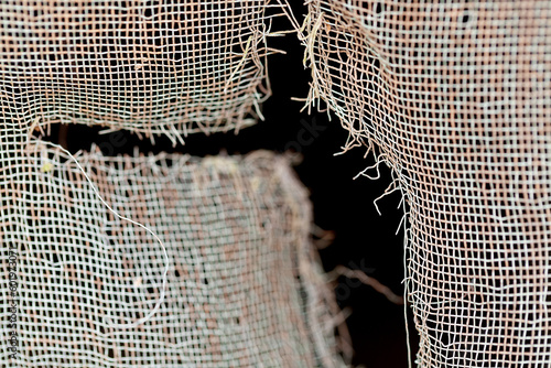 Close up of torn flyscreen photo