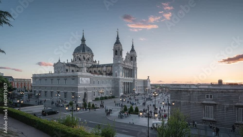 Almudena Cathedral, Catholic church sunset time lapse in Madrid, Spain photo