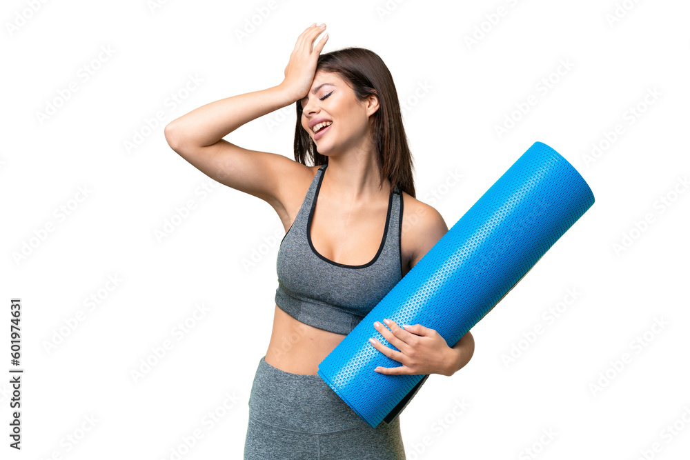 Young sport woman going to yoga classes while holding a mat over isolated chroma key background has realized something and intending the solution Young sport woman going to yoga classes while holding a mat over isolated chroma key background has realized something and intending the solution