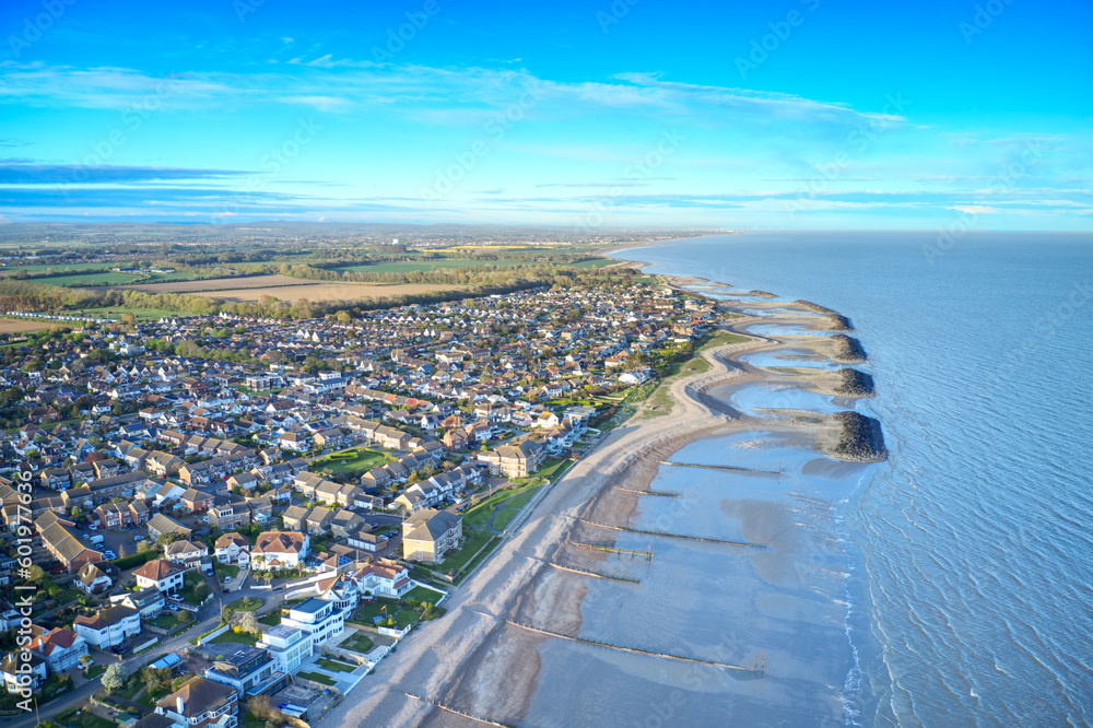 Fototapeta premium Aerial photo along the coastline from Middleton Sea in West Sussex towards Elmer and the Elmer Rock Islands sea defence.