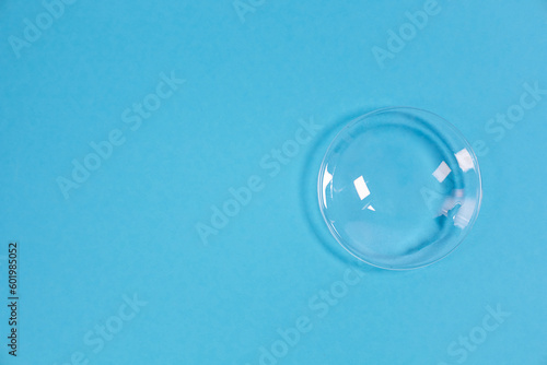 glass bowl on blue background