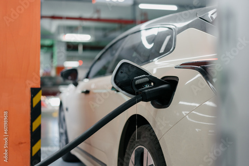 electric car charging in station 