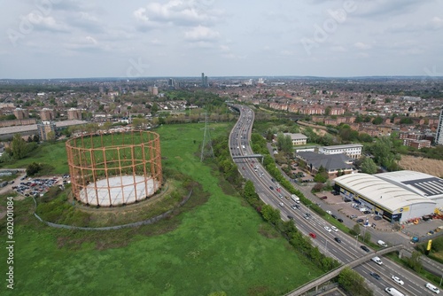 Disused gas holder East Ham London UK over head drone aerial .