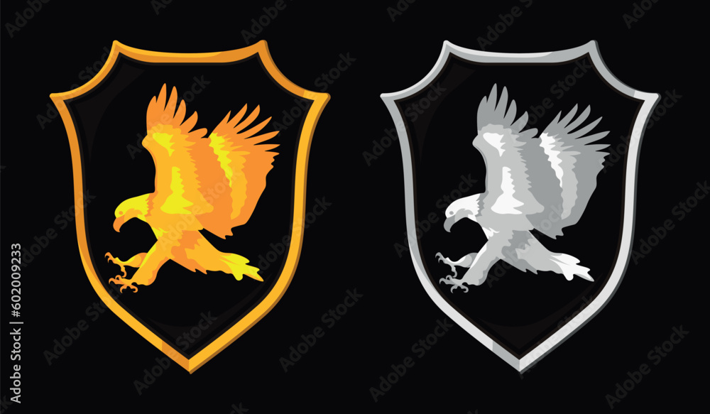 Heraldic shield with wings. Golden & silver eagle hunting. Isolated vector. Concept art. Logo. Heraldic shield with wings. Golden & silver eagle hunting. Isolated vector. Concept art. Logo.