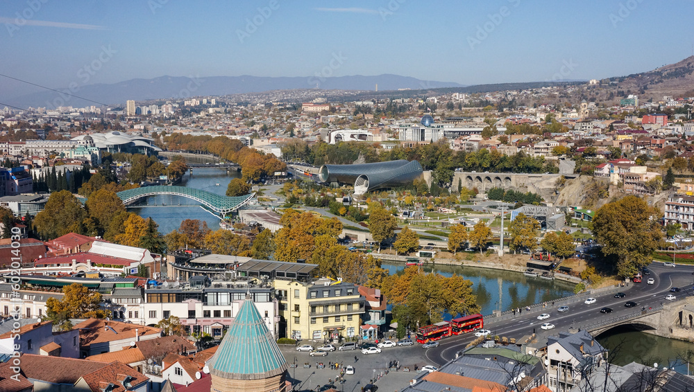 Panoramic view on Tbilisi and Kura river with Bridge of Piece, Georgia