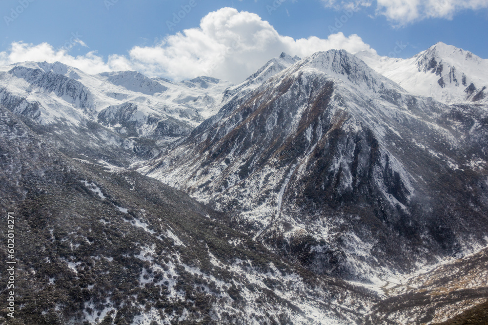 Snow covered peaks near Siguniangshan town in Sichuan province, China