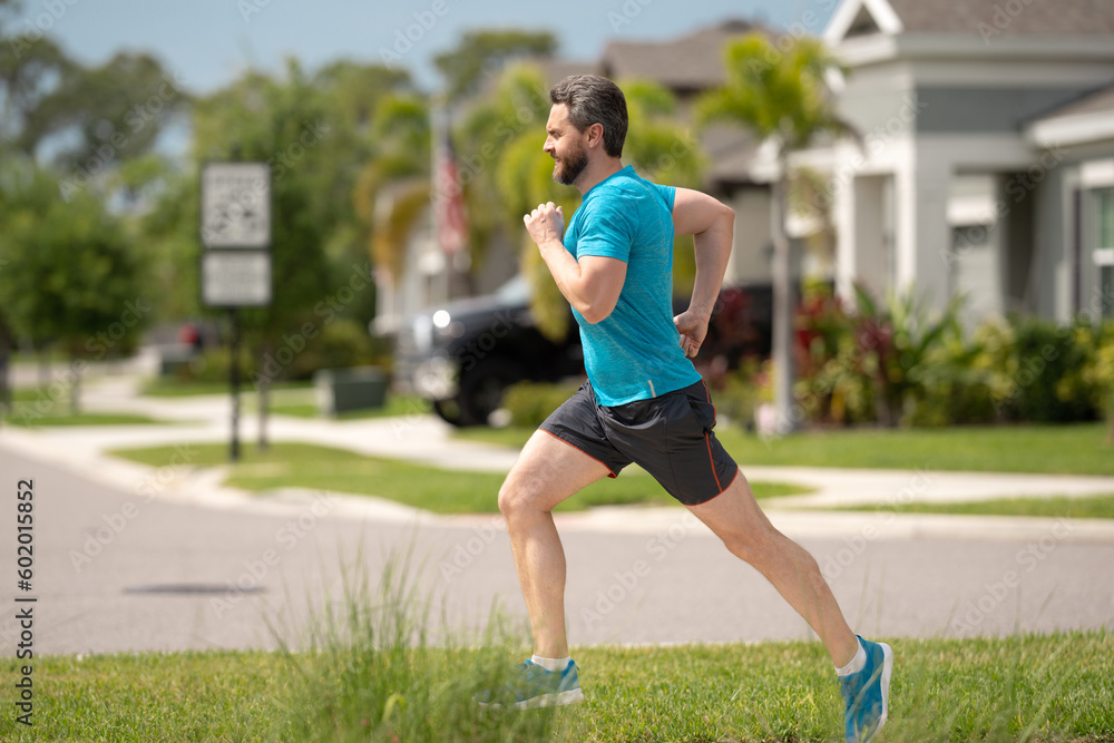 Sport runner. Man running. Fit male sport fitness model sprinting