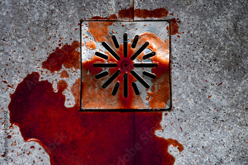 Shower drain with traces of very red blood. Image that evokes the world of true crime. Horizontal.