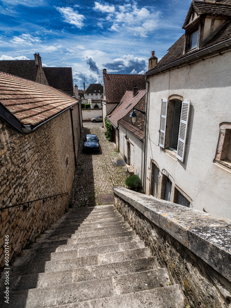 Empty streets of the medieval city of Beaune in Burgundy. The stormy sky