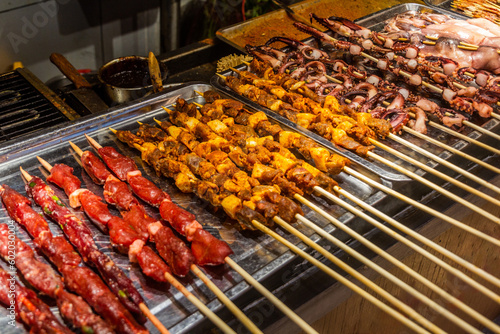 Street food skewers in the old town of Lijiang  Yunnan province  China