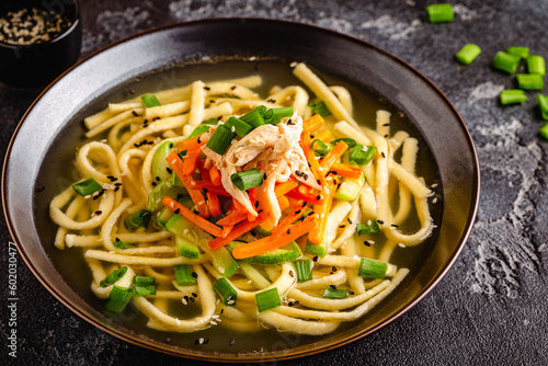 Traditional Korean chicken soup with homemade noodles