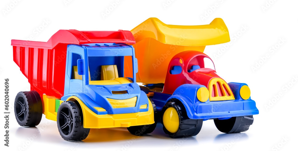 Fototapeta premium Colorful plastic dump trucks isolated on white background