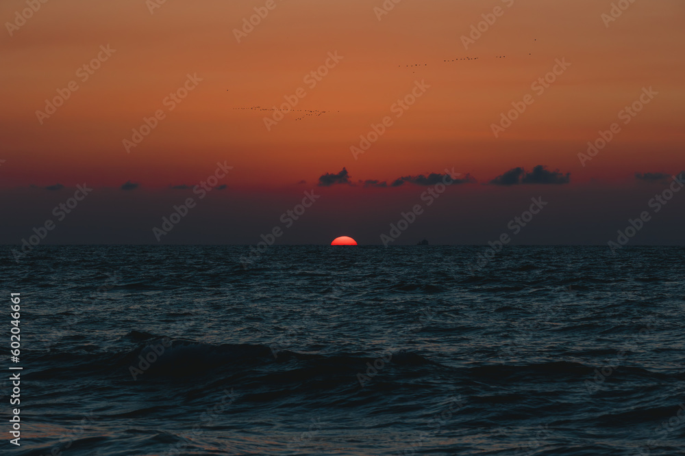 sunset in the sea. The photo was taken in La Union Philippines. sunset in the sea. The photo was taken in La Union Philippines.