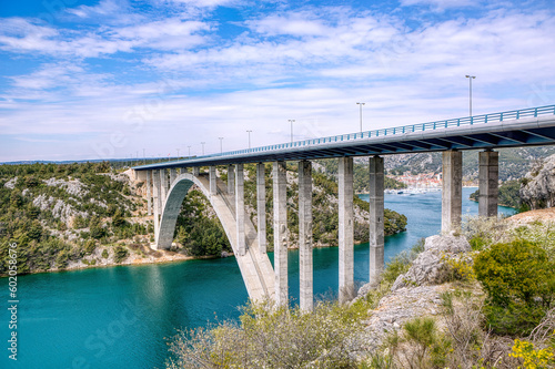 View at the bridge over the river krka in croatia with Skradin in the beackground, Dalmatia in early spring © Annabell Gsödl