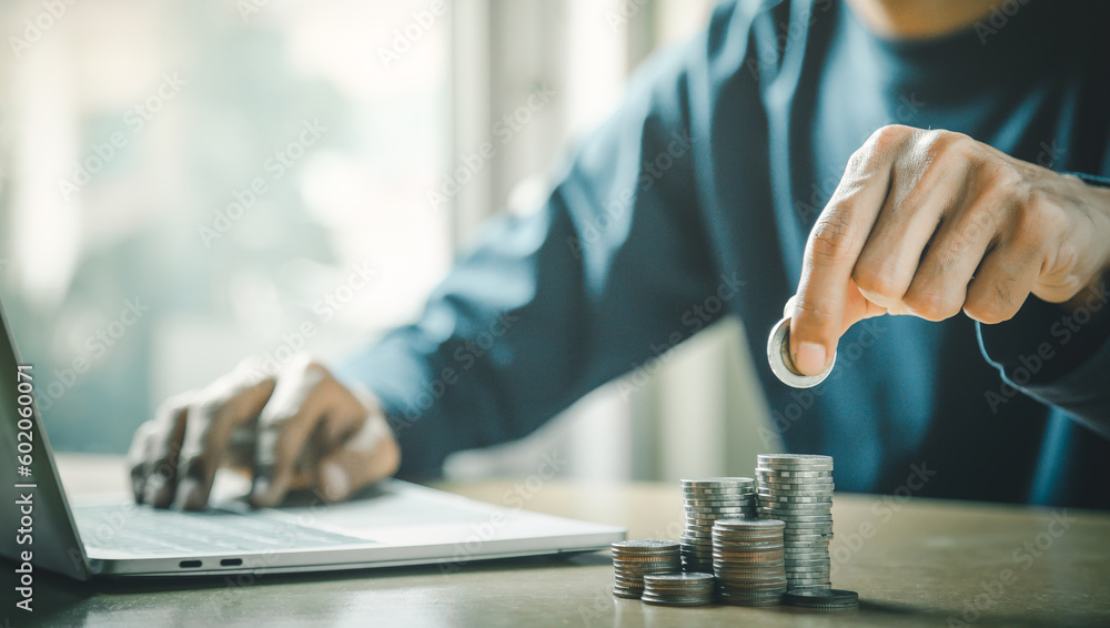 Man hands putting coins stack, Concept business finance saving money and investment. Man hands putting coins stack, Concept business finance saving money and investment.