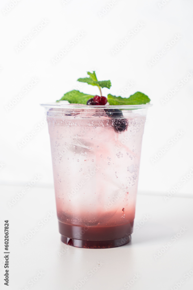 mix berry with soda in glass mix berry with soda in glass
