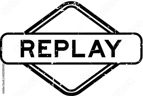 Grunge black replay word rubber seal stamp on white background