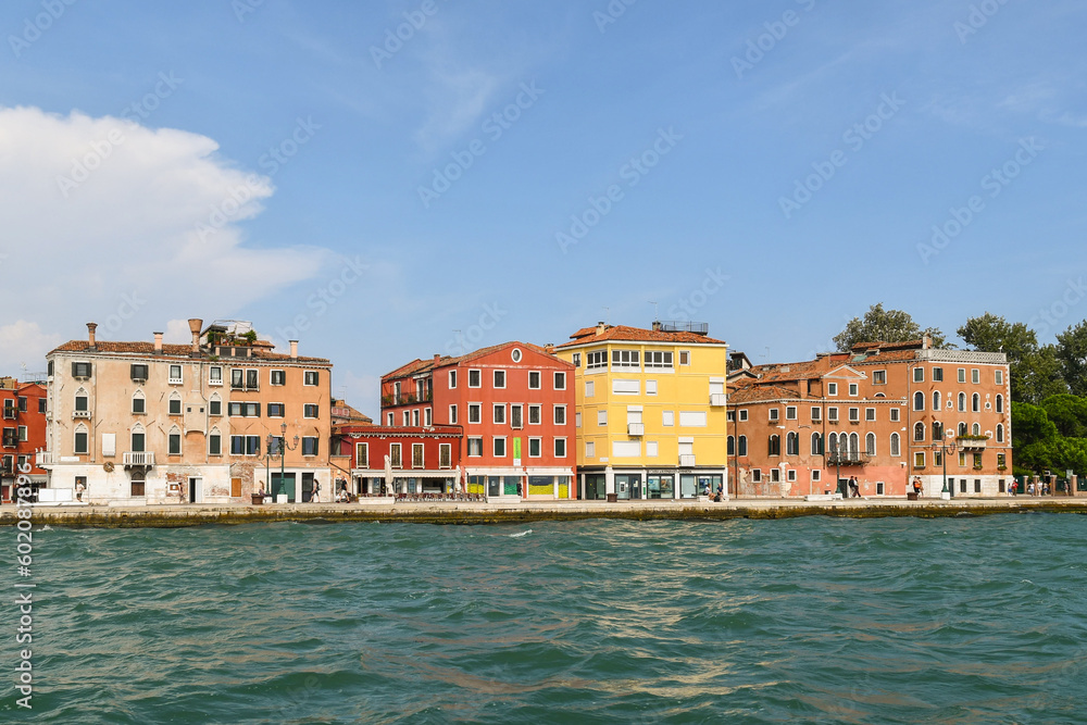 Riva dei Sette Martiri waterfront with the typical colorful houses overlooking the San Marco basin, Venice, Veneto, Italy
