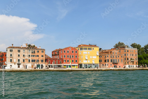 Riva dei Sette Martiri waterfront with the typical colorful houses overlooking the San Marco basin, Venice, Veneto, Italy