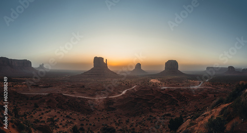 Panoramic view of Monument Valley USA Utah during Sunset and sunrise with famout view to the sisters and west mitten butte