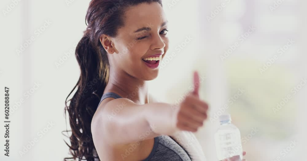 Fitness, health and thumbs up with face of woman for winner, workout and cardio endurance. Success, winner and motivation with portrait of girl athlete and water bottle for exercise, sports and goal Fitness, health and thumbs up with face of woman for winner, workout and cardio endurance. Success, winner and motivation with portrait of girl athlete and water bottle for exercise, sports and goal
