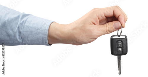 Fototapeta Hand holding a car key, cut out