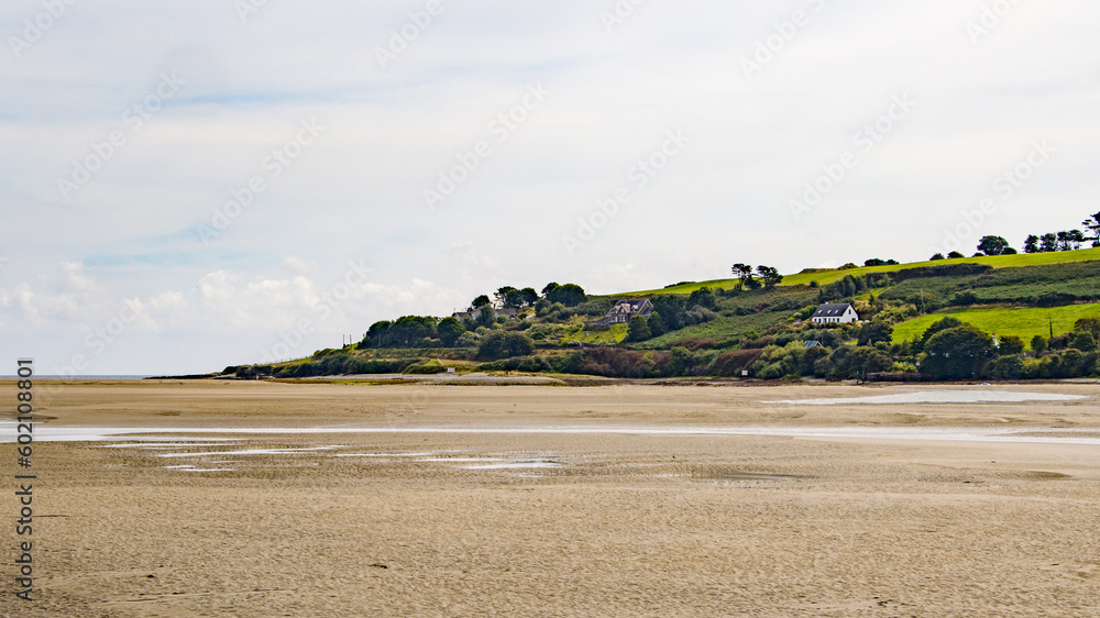 Sandy beach on a summer day. Seaside landscape of Ireland.