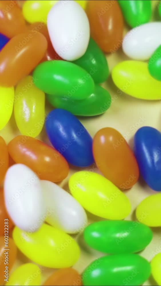 Slow motion close-up of colorful jelly beans Slow motion close-up of colorful jelly beans