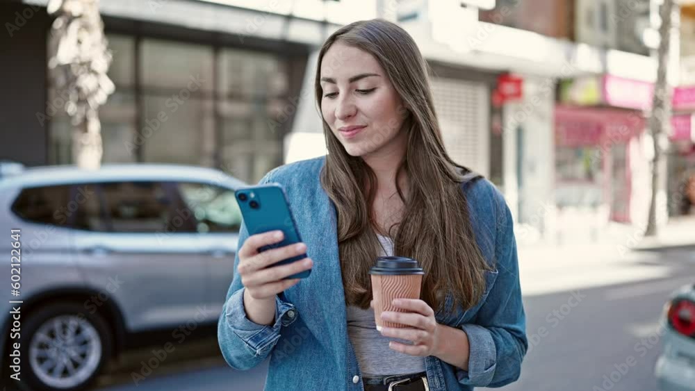 Young beautiful hispanic woman using smartphone drinking coffee at street Young beautiful hispanic woman using smartphone drinking coffee at street