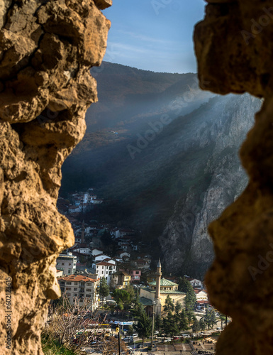 Nice view of a village from a rock in the mountain. Beautiful Turkish valley at sunset. Concept of travel in nature.  Scene with creat canyon.